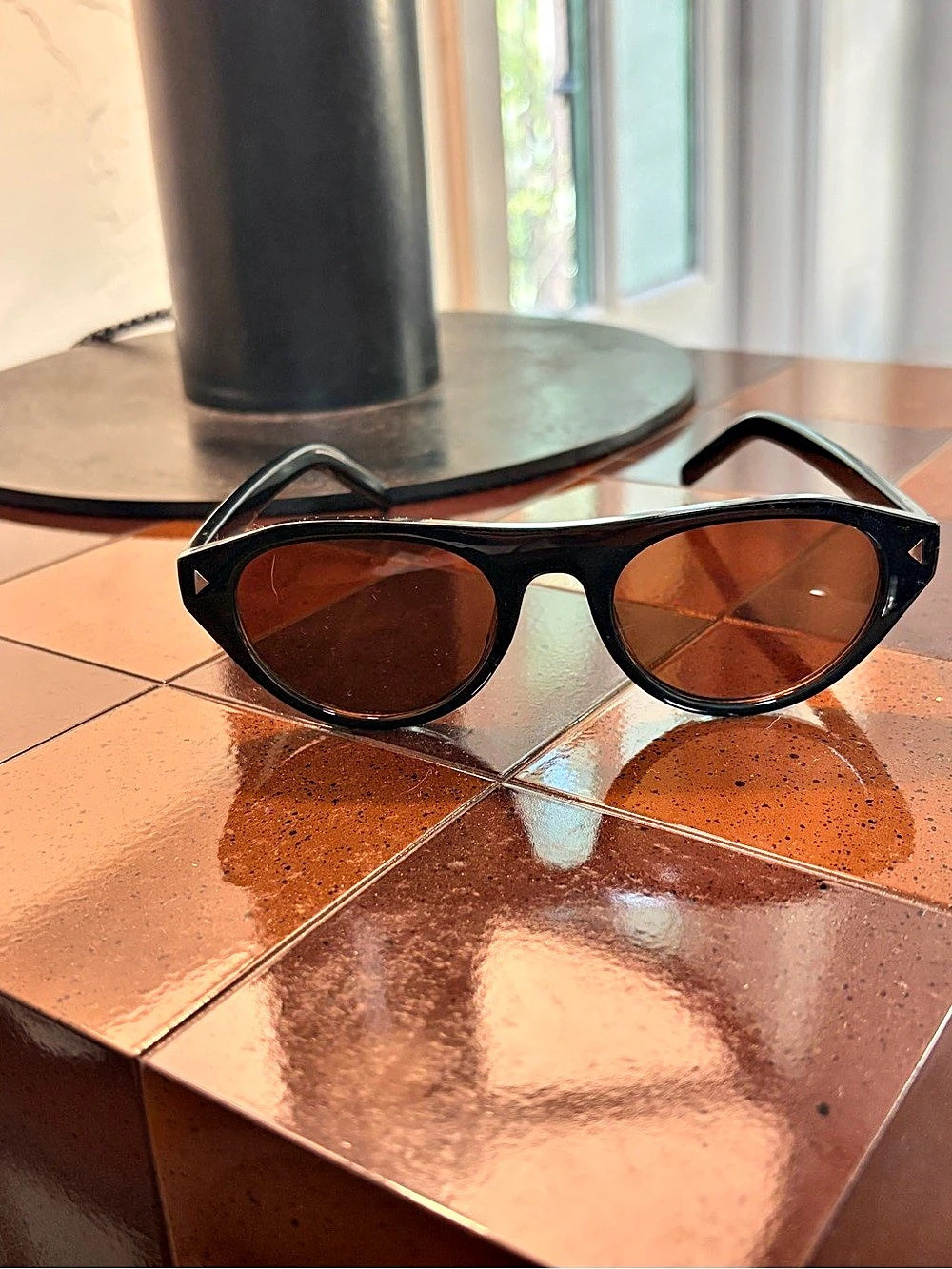 Black Aviator-Style Glasses with Brown-Tinted Lenses
